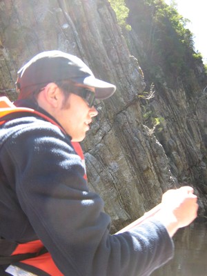 Paddling in front of rocks